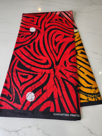 Black, Orange, and Red Ankara Print Fabric